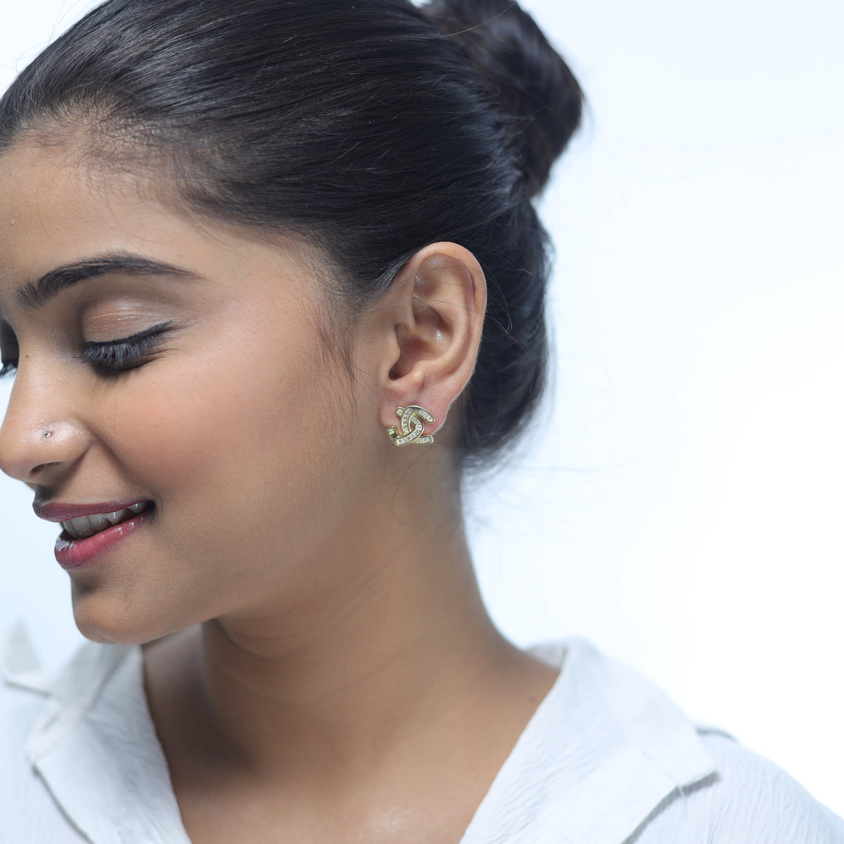 925 Silver Gold Interlock Radiance Studs - 925 sterling silver earrings by Tassya Silver