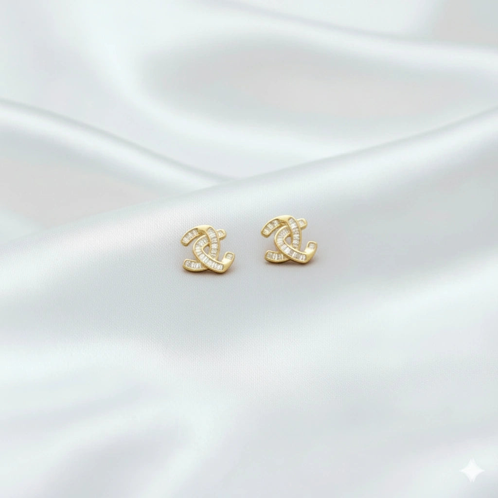 925 Silver Gold Interlock Radiance Studs - 925 sterling silver earrings by Tassya Silver