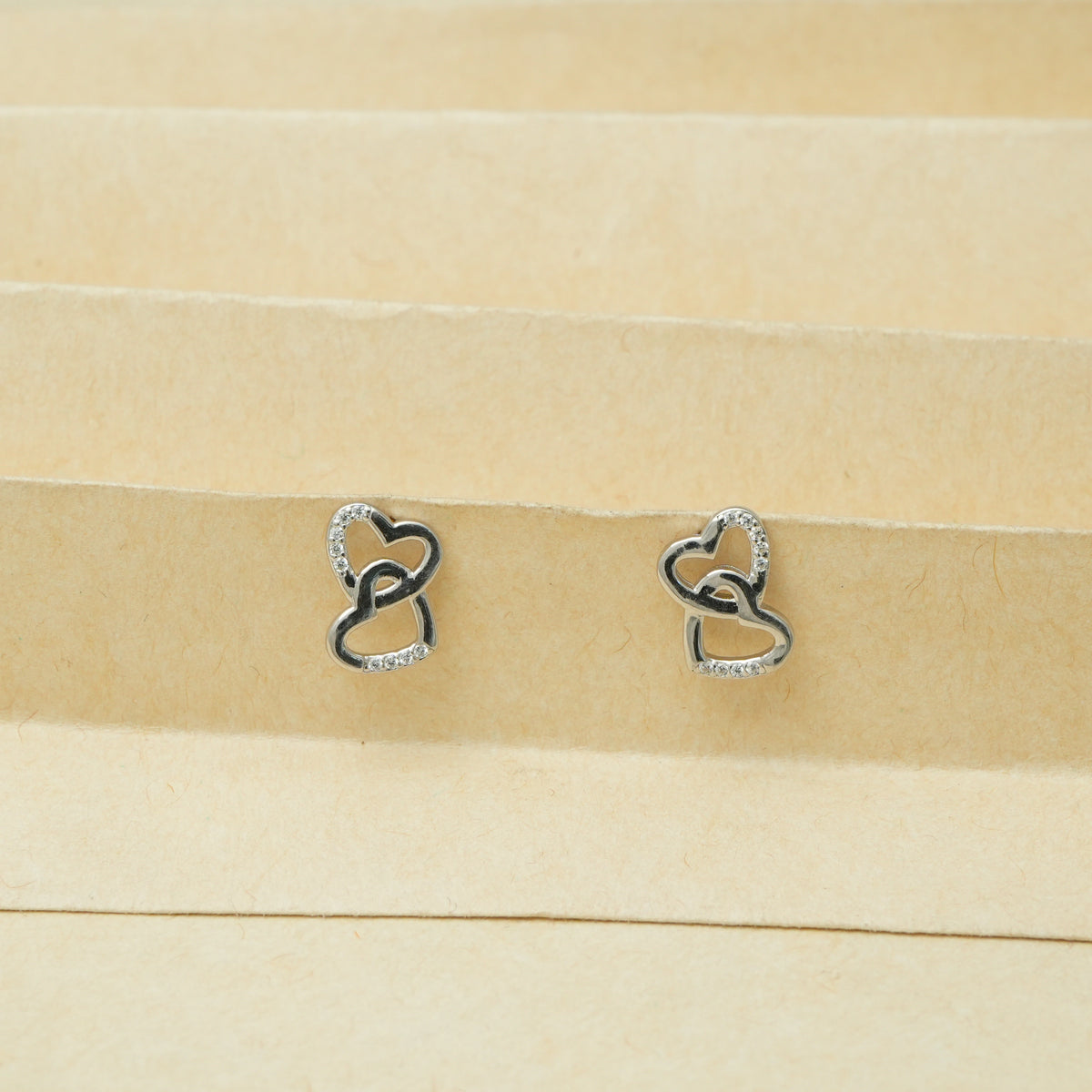925 Silver Linked Hearts Top - 925 sterling silver earrings by Tassya Silver