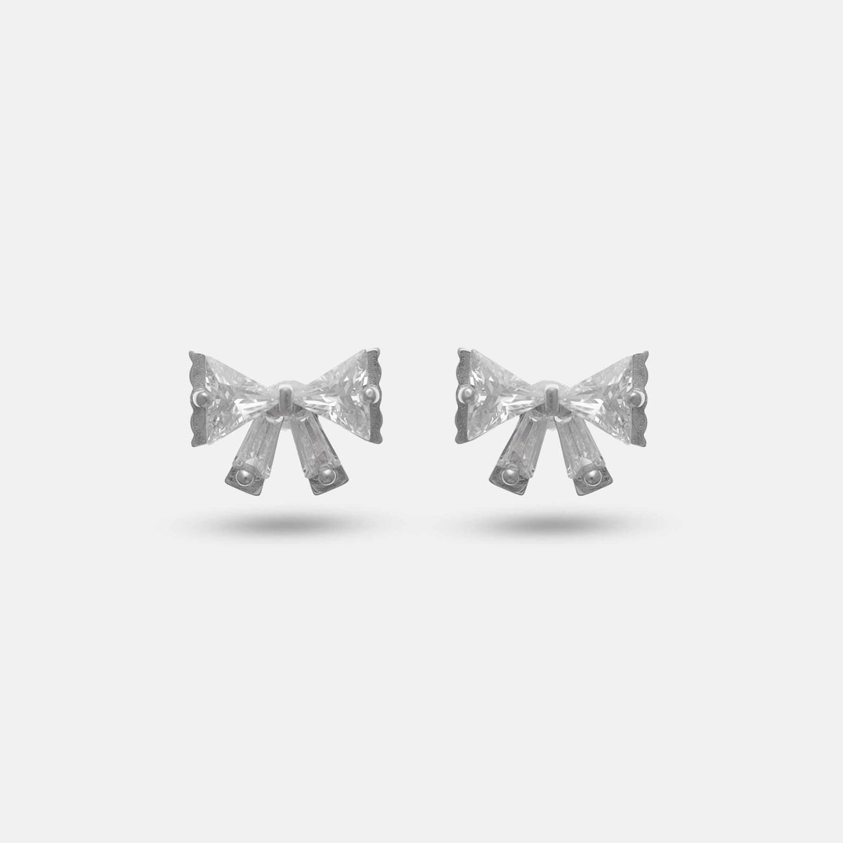 25 Silver Radiant Ribbon Bow Studs - 925 sterling silver earrings by Tassya Silver