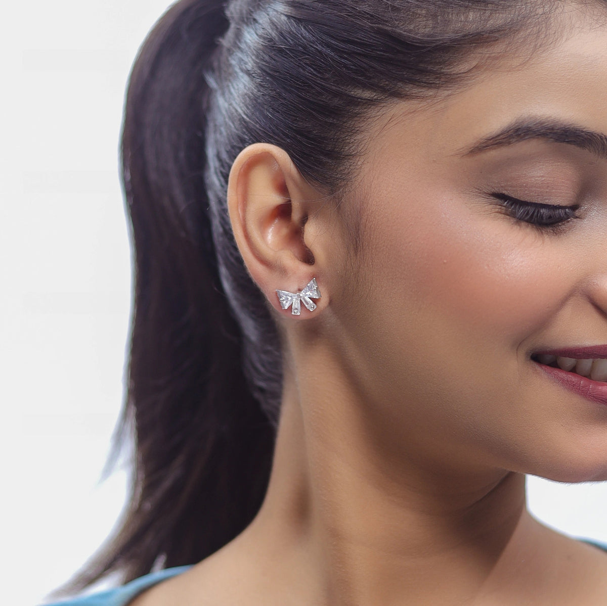 25 Silver Radiant Ribbon Bow Studs - 925 sterling silver earrings by Tassya Silver
